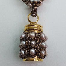 Load image into Gallery viewer, Cremation jewellery. Pearl encrusted fine beaded urn pendant on pearl and metallic beaded chain