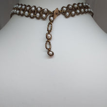 Load image into Gallery viewer, Showing the back adjustable toggle of boho style multi-strand necklace with natural freshwater pearl and intricately woven metallic glass micro-beads and Swarovski drops.