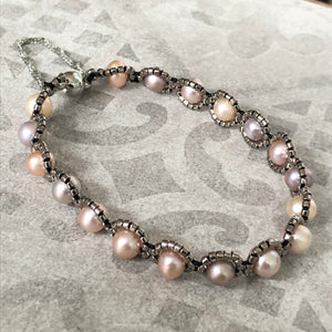 Fine beaded pearl bracelet with metallic glass micro-beading and magnetic clasp with safety chain