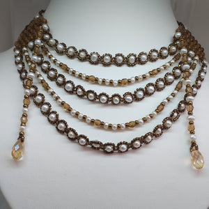 boho style multi-strand necklace with natural freshwater pearl and intricately woven metallic glass micro-beads and Swarovski drops.