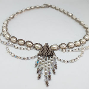 Fine beaded Elizabethan style collar necklace with freshwater pearl, Swarovski crystal and metallic micro beading.