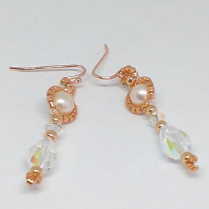 Fine beaded pearl drop earrings with metallic micro-beads and Swarovski teardrops