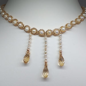 Fine beaded pearl choker with 3 crystal teardrops and metallic micro-beading.
