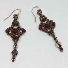 Load image into Gallery viewer, Celtic cross shape beaded earrings with facetted garnet and Swarovski crystal in metallic bronze theme micro-beading