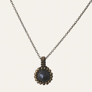 Pearl pendant necklace. Beaded jewellery. Large round freshwater black pearl surrounded by metallic bronze-tone glass beads.