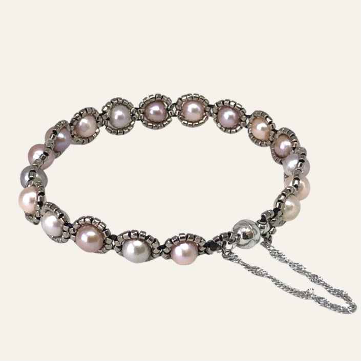 Fine beaded pearl bracelet with metallic glass micro-beading and magnetic clasp with safety chain