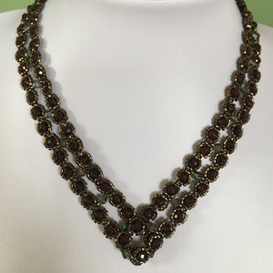 V shaped fine beaded necklace with facetted garnet and metallic bronze micro-beads