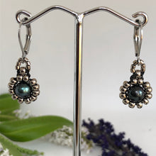 Load image into Gallery viewer, Beaded pearl earrings with silver-tone glass beads circling a freshwater black pearl on lever-back steel wires