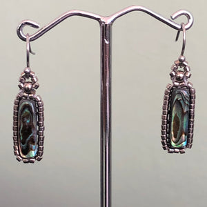 Paua earrings: Paua/Abalone shell flute surrounded by metallic glass micro-beads 