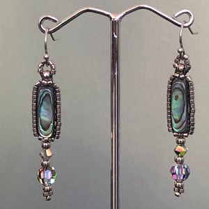 Paua earrings: Paua/Abalone shell flute surrounded by metallic glass micro-beads with a Swarovski crystal drop