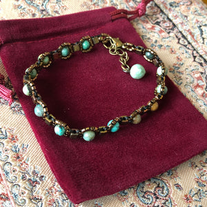 Beaded jewellery (jewelry); fine beaded turquoise bracelet with velvet gift pouch