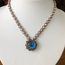 Load image into Gallery viewer, Labradorite pendant necklace framed by a metallic micro-beading and Swarovski crystal on a freshwater pearl beaded necklace