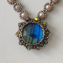 Load image into Gallery viewer, Labradorite pendant necklace framed by a metallic micro-beading and Swarovski crystal on a freshwater pearl beaded necklace