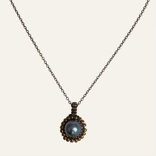 Load image into Gallery viewer, Pearl pendant necklace. Beaded jewellery. Large round blue freshwater pearl surrounded by metallic bronze-tone glass beads.