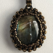 Load image into Gallery viewer, Golden flash labradorite cabochon pendant framed by fine beading of metallic glass micro beads